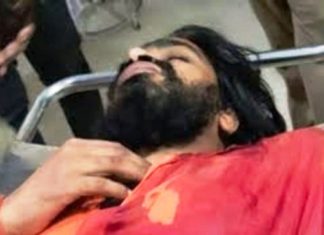पुजारी को गोली